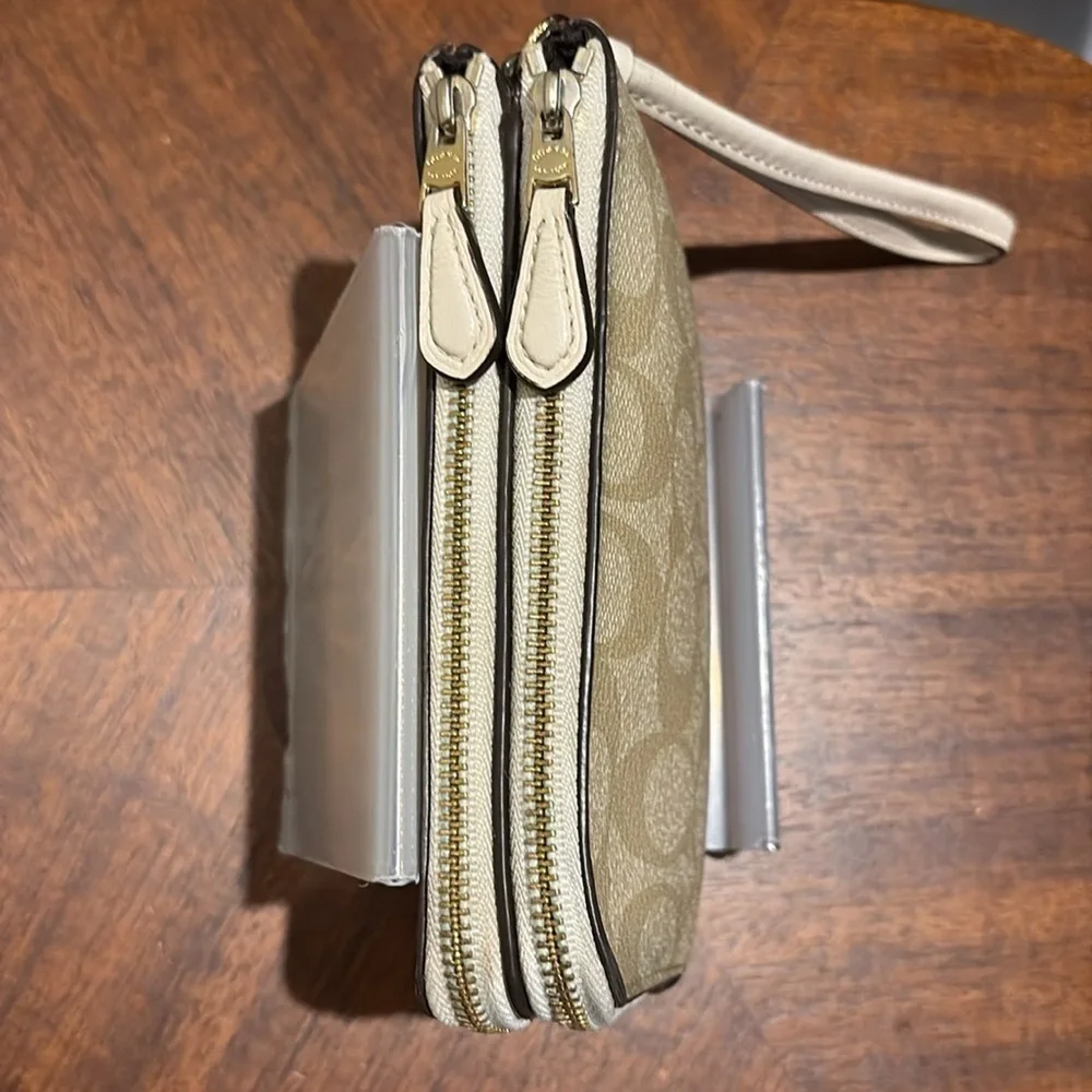Coach  double zip wristlet  wallet coated canvas  tan/cream, monogram print  GUC